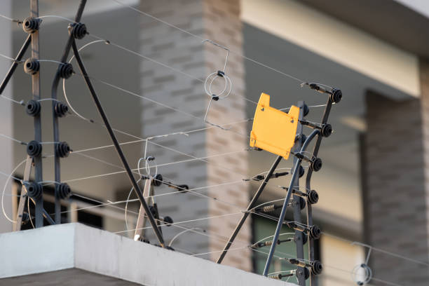 high electric fence with blank yellow tag, security fence system for house protection.